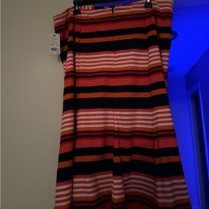 A colorful, striped XL NY Collection misses skirt with bold horizontal patterns